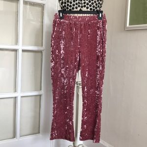 Pink crushed velvet pants.